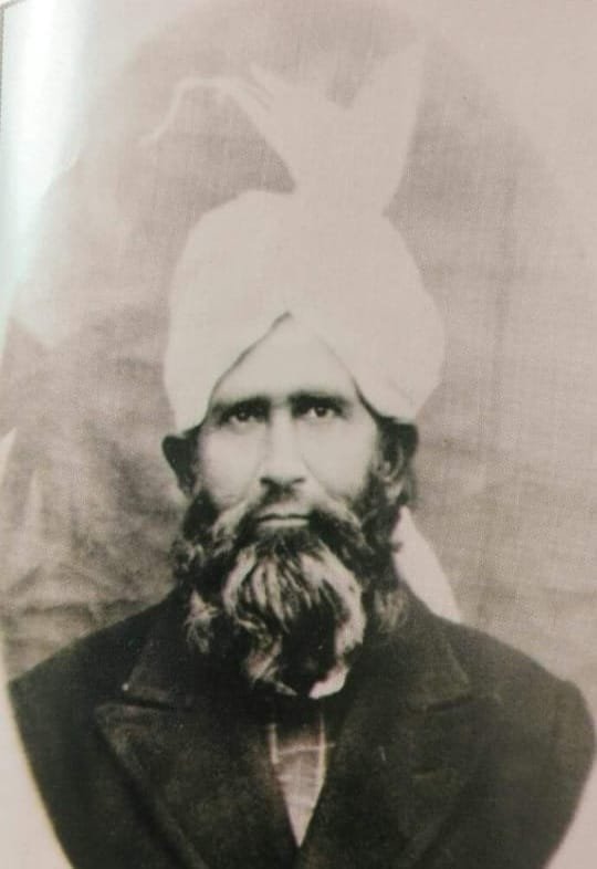 Vintage black-and-white portrait photograph of Shaikh al-Islam Ghulam Muhammad Muhaddith-e-Ghotvi
